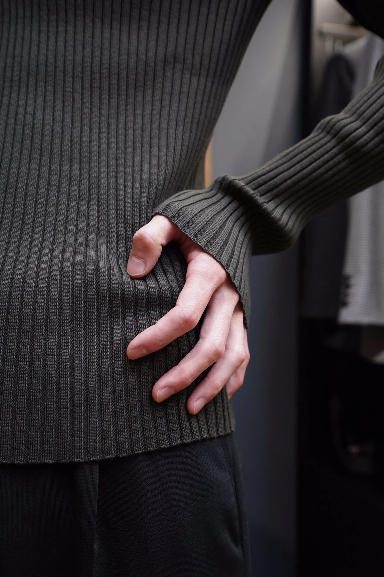 UNIFORME FUNNEL NECK MERINO WOOL SWEATER