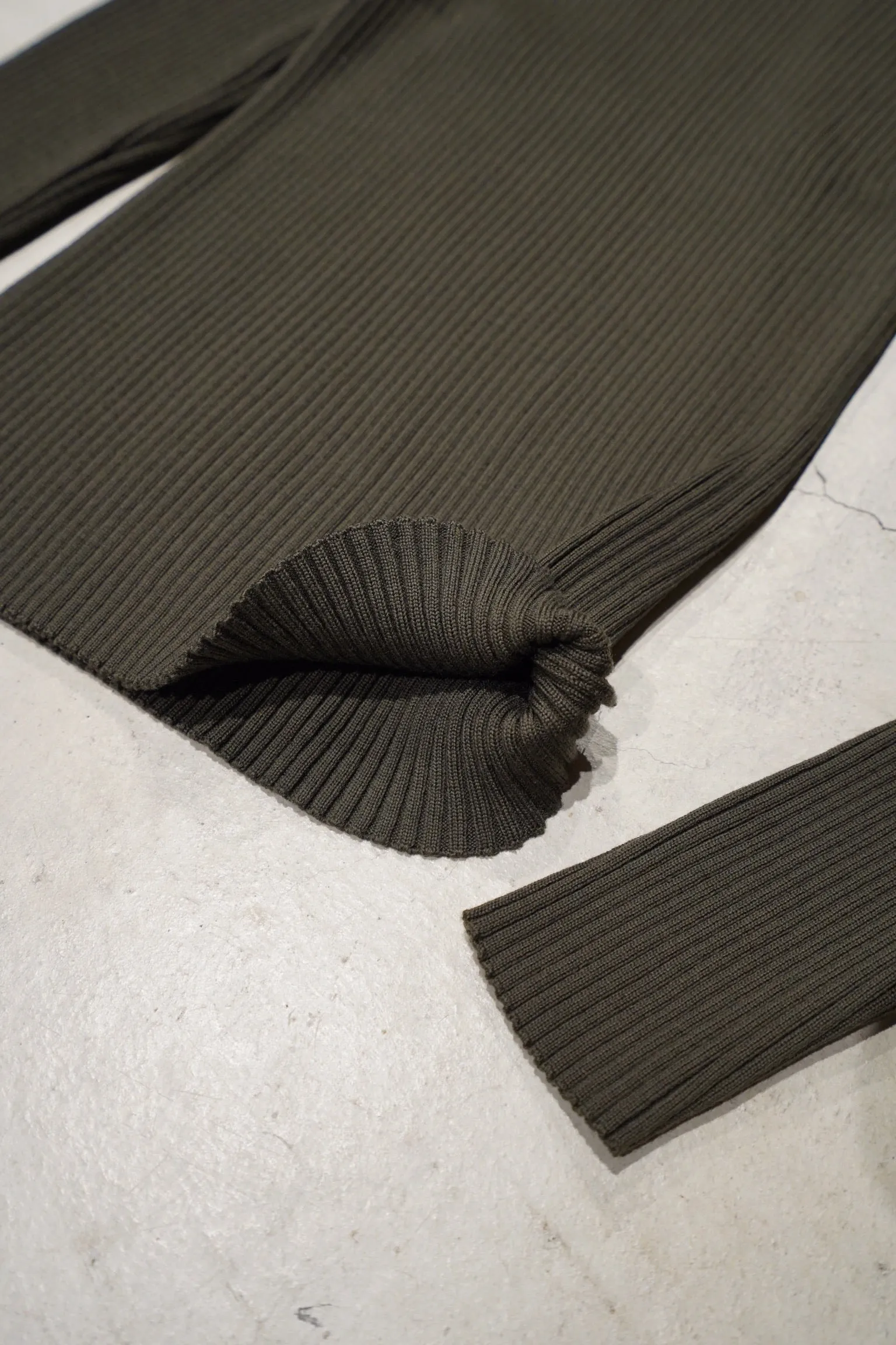 UNIFORME FUNNEL NECK MERINO WOOL SWEATER