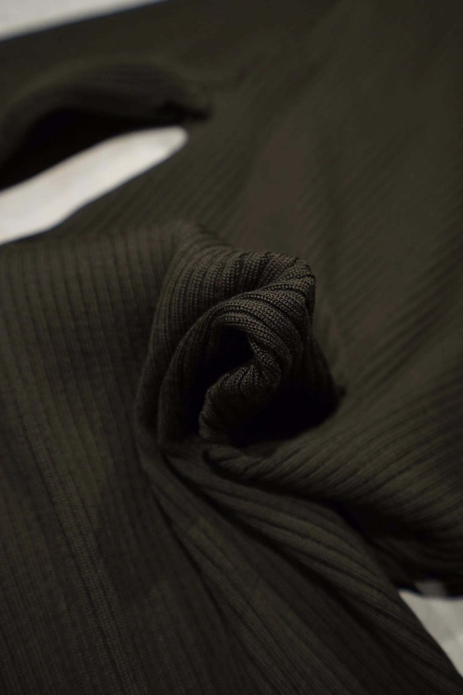 UNIFORME FUNNEL NECK MERINO WOOL SWEATER
