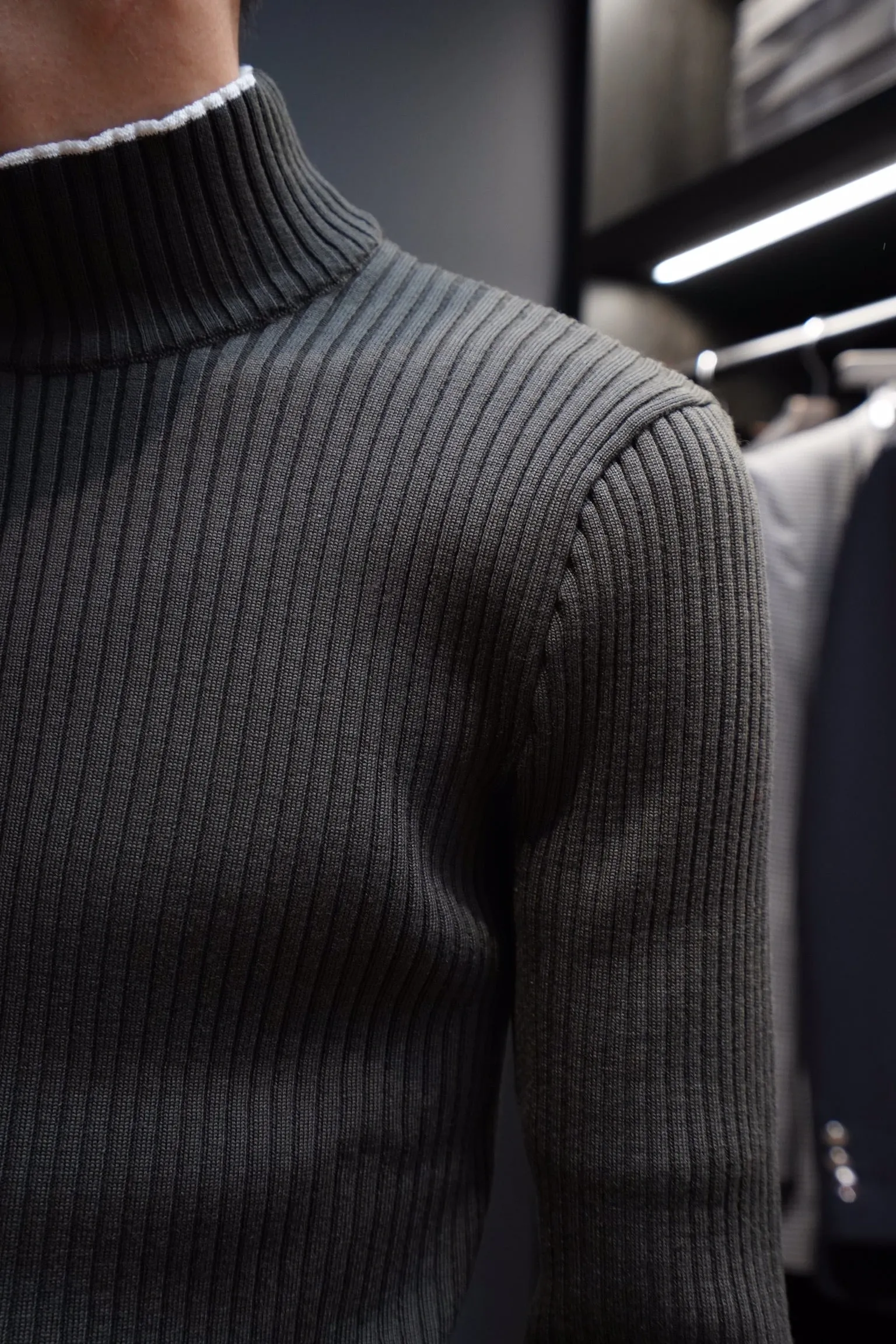 UNIFORME FUNNEL NECK MERINO WOOL SWEATER