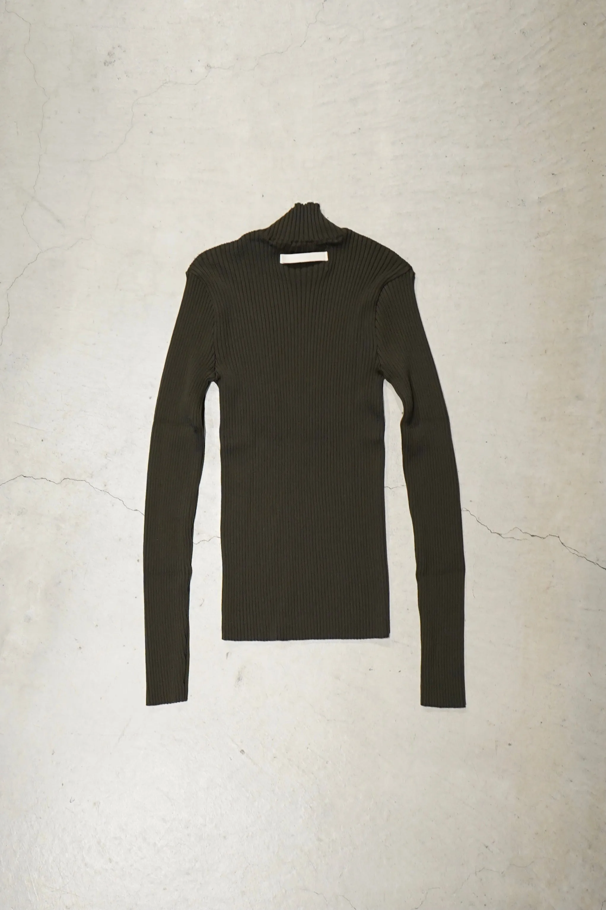 UNIFORME FUNNEL NECK MERINO WOOL SWEATER