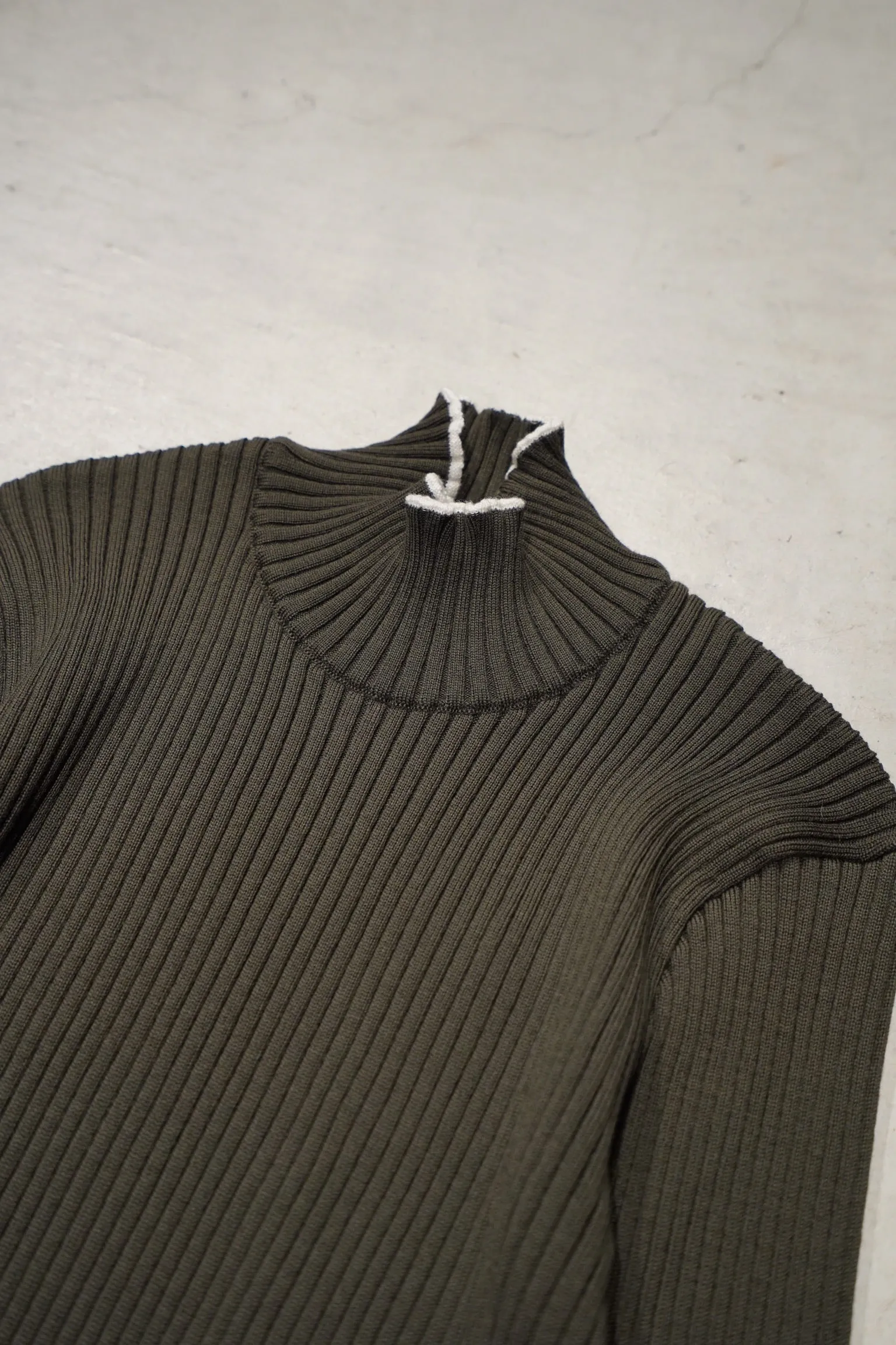 UNIFORME FUNNEL NECK MERINO WOOL SWEATER